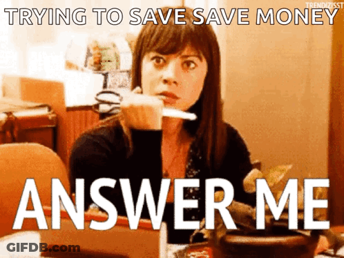 A Woman Is Sitting At A Table With A Knife In Her Hand And The Words " Trying To Save Save Money Answer Me " Behind Her GIF