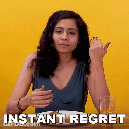 A Woman Is Sitting At A Table With A Plate Of Food And A Glass Of Water With The Words Instant Regret Written On The Bot GIF