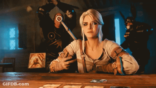 A Woman Is Sitting At A Table With A Sword And A Tarot Card GIF