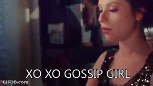 A Woman Is Sitting At A Table With Her Eyes Closed And The Words `` Xo Xo Gossip Girl '' Written On Her Face . GIF