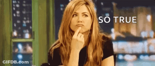 A Woman Is Sitting At A Table With Her Finger On Her Chin And The Words `` So True '' Written Above Her . GIF