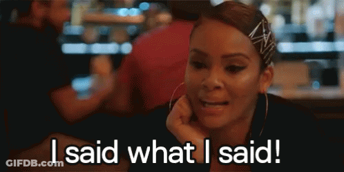 A Woman Is Sitting At A Table With Her Hand On Her Chin And Says `` I Said What I Said ! '' GIF