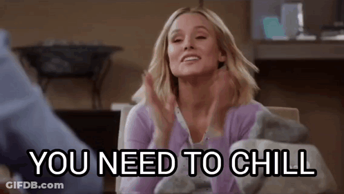 A Woman Is Sitting At A Table With Her Hands Up And The Words `` You Need To Chill '' . GIF