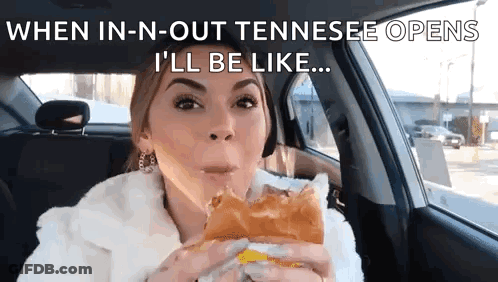 A Woman Is Sitting In A Car Eating A Sandwich With The Caption When In-N-Out Tennessee Opens GIF