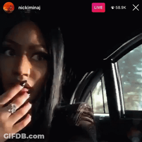 A Woman Is Sitting In A Car With A Live Button On The Bottom GIF