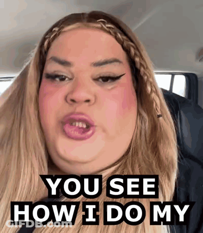 A Woman Is Sitting In A Car With Her Mouth Open And Says `` You See How I Do My '' . GIF