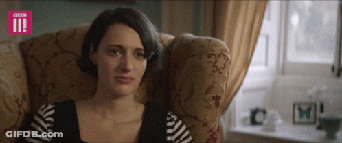 A Woman Is Sitting In A Chair With A Bbc Logo On The Bottom Right GIF