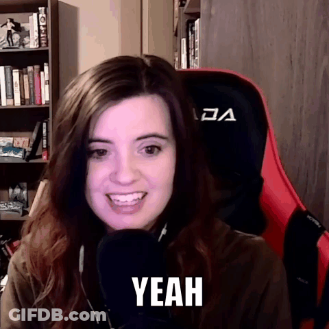 A Woman Is Sitting In A Chair With A Microphone And The Word Yeah Is On Her Face . GIF
