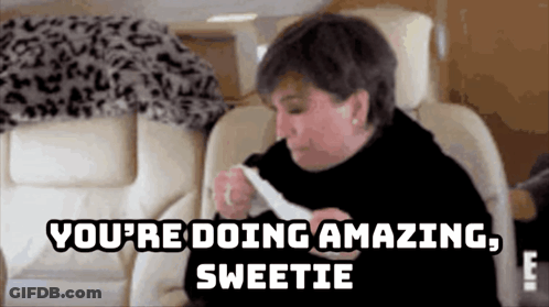 A Woman Is Sitting In A Chair With A Napkin In Her Hand And The Words `` You 'Re Doing Amazing Sweetie '' . GIF