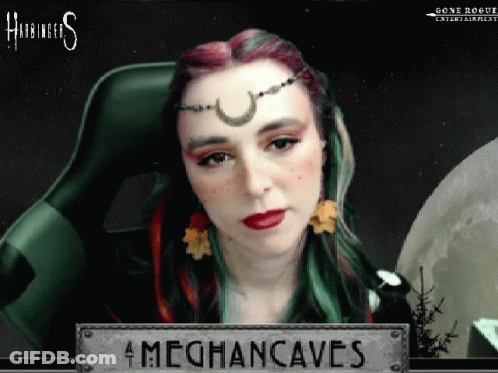 A Woman Is Sitting In A Chair With A Sign That Says Meghancaves On It GIF