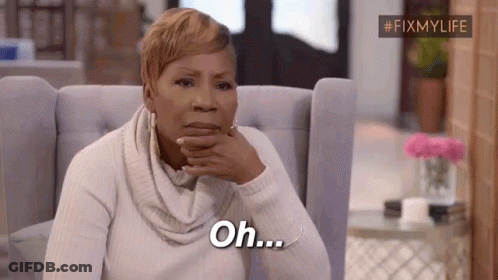 A Woman Is Sitting In A Chair With Her Hand On Her Chin And Says `` Oh '' . GIF