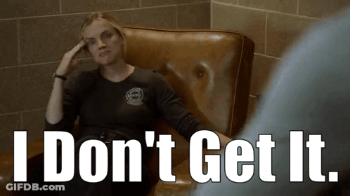 A Woman Is Sitting In A Chair With The Words " I Don 'T Get It " Written Below Her GIF
