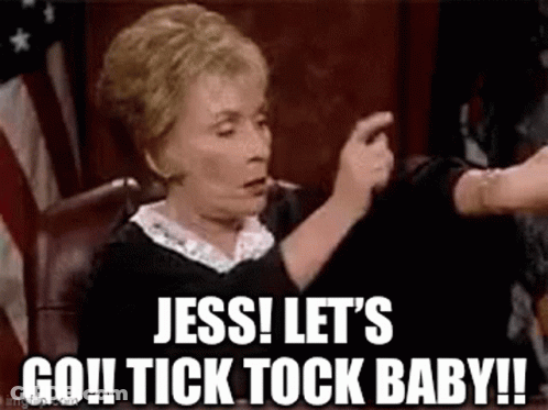 Woman Sitting In Court Making Funny Face And Holding Hand Of Another Woman GIF