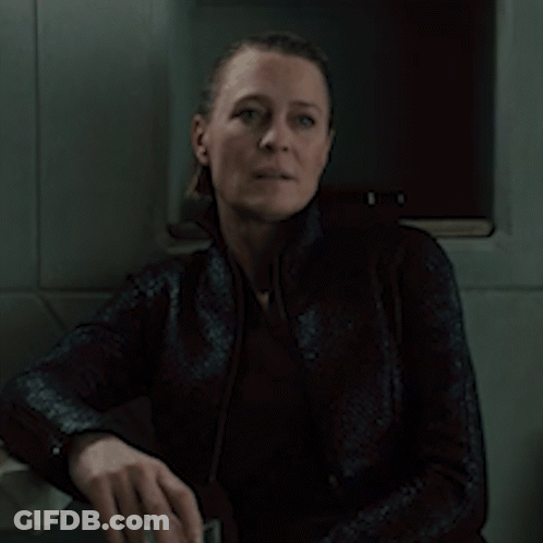 A Woman Is Sitting In A Dark Room And Says It 'S A Good One GIF