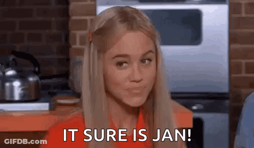 A Woman Is Sitting In A Kitchen And Says `` It Sure Is Jan ! '' GIF