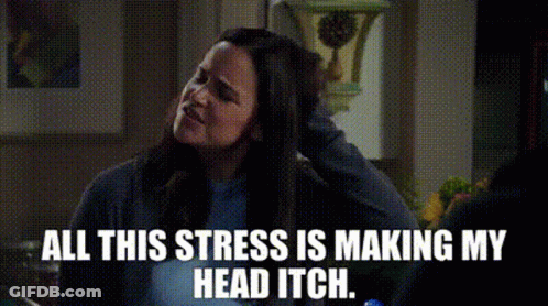 A Woman Is Sitting In A Kitchen Talking To A Man And Says `` All This Stress Is Making My Head Itch . `` GIF