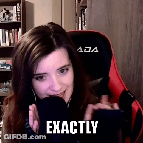 A Woman Is Sitting In A Red And Black Chair With The Word Exactly On Her Face GIF
