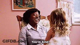 A Woman Is Sitting In A Rocking Chair Talking To A Little Girl And Saying `` You Is Kind '' . GIF