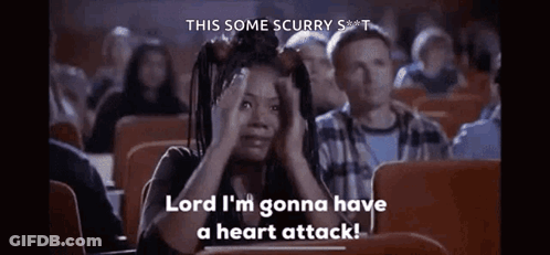 A Woman Is Sitting In A Theater Watching A Movie And Saying `` Lord I 'M Gonna Have A Heart Attack '' GIF
