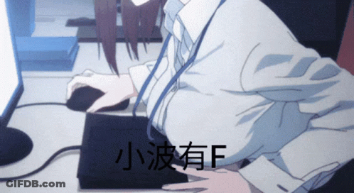 A Woman Is Sitting In Front Of A Computer With Chinese Writing On The Bottom Right GIF