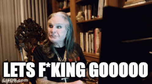 A Woman Is Sitting In Front Of A Computer With The Words Let 'S F * King Gooooo Written Below Her GIF