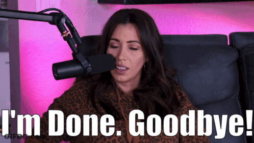 A Woman Is Sitting In Front Of A Microphone And Says I 'M Done Goodbye GIF