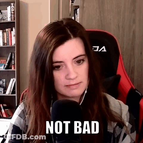 A Woman Is Sitting In Front Of A Microphone And Says Not Bad GIF