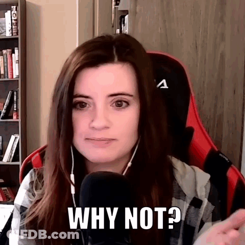 A Woman Is Sitting In Front Of A Microphone And Says Why Not . GIF