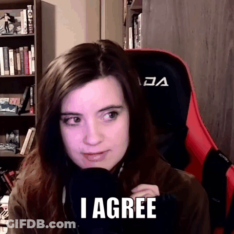 A Woman Is Sitting In Front Of A Microphone With The Words I Agree On Her Face . GIF