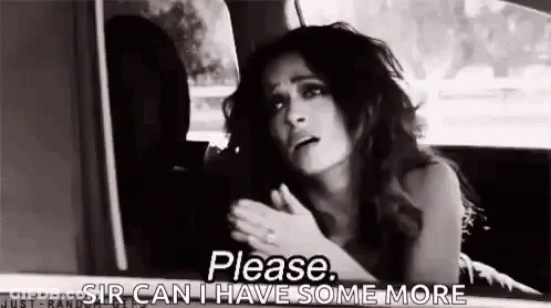 A Woman Is Sitting In The Back Seat Of A Car And Asking For Something . GIF