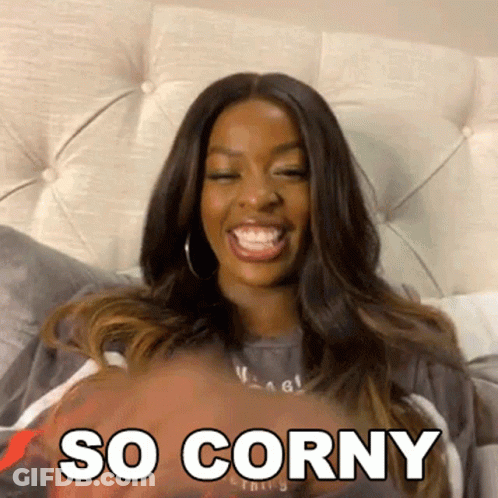A Woman Is Sitting On A Bed With Her Eyes Closed And The Words So Corny Written On Her Face GIF