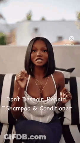 A Woman Is Sitting On A Black And White Striped Couch Talking About Shampoo And Conditioner . GIF