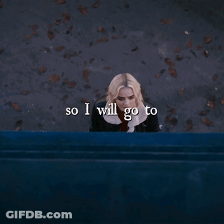 A Woman Is Sitting On A Blue Bench With The Words So I Will Go To Written Below Her GIF