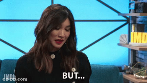 A Woman Is Sitting On A Blue Couch And Says But GIF