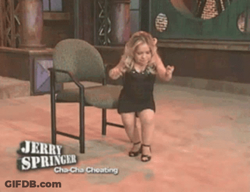 A Woman Is Sitting On A Chair With The Words Jerry Springer Cha-Cha Cheating GIF