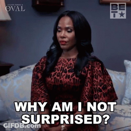 A Woman Is Sitting On A Couch And Saying Why Am I Not Surprised GIF
