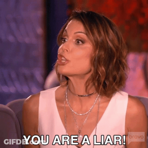 A Woman Is Sitting On A Couch And Saying You Are A Liar Bravo GIF