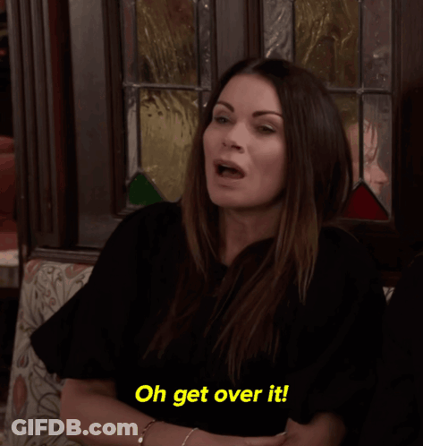 A Woman Is Sitting On A Couch And Says Oh Get Over It GIF