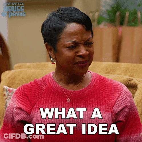 A Woman Is Sitting On A Couch And Says What A Great Idea GIF