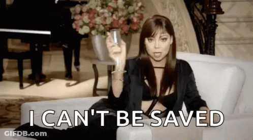 Woman Sitting On Couch With Wine Saying I Can't Be Saved GIF