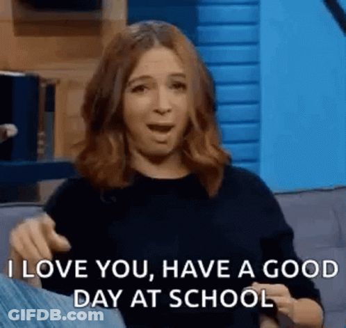 A Woman Is Sitting On A Couch Saying `` I Love You , Have A Good Day At School '' GIF