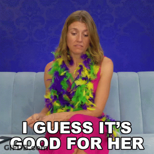 A Woman Is Sitting On A Couch With A Feather Boa Around Her Neck And The Words I Guess It 'S Good For Her GIF