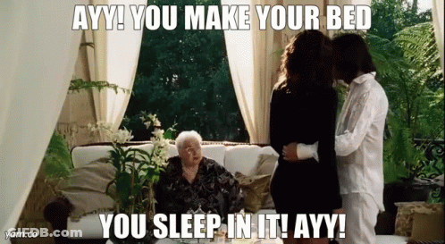 A Woman Is Sitting On A Couch With A Man And A Woman . GIF