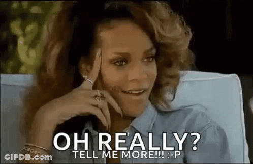 A Woman Is Sitting On A Couch With Her Hand On Her Head And Says `` Oh Really ? Tell Me More !! '' GIF