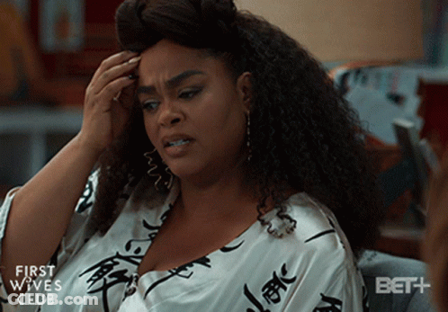 A Woman Is Sitting On A Couch With Her Hand On Her Head And The Words First Wives Club On The Bottom GIF