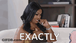 A Woman Is Sitting On A Couch With The Word Exactly Above Her Head . GIF