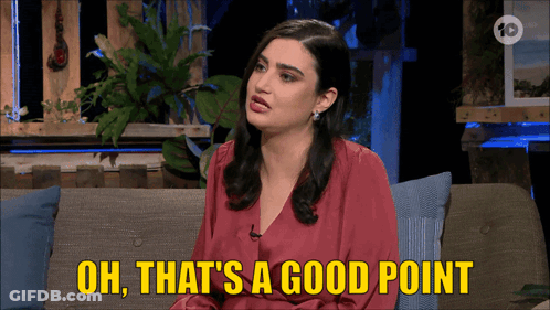 A Woman Is Sitting On A Couch With The Words Oh That 'S A Good Point GIF