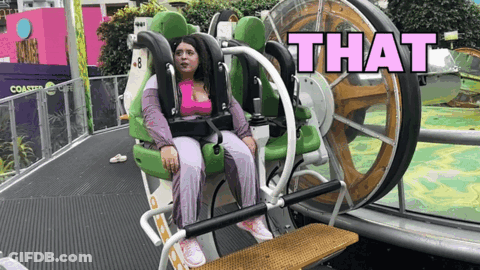 A Woman Is Sitting On A Roller Coaster With The Words That Written Above Her GIF