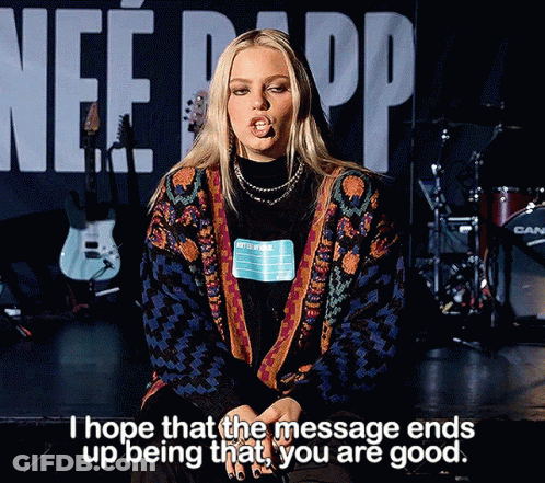 A Woman Is Sitting On A Stage With The Words " I Hope That The Message Ends Up Being That You Are Good " GIF