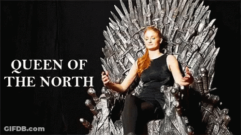 A Woman Is Sitting On A Throne With The Words Queen Of The North Behind Her GIF